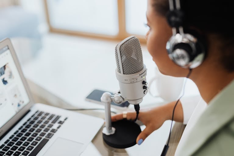 Professional woman recording a podcast fulfilling her Life's Work.